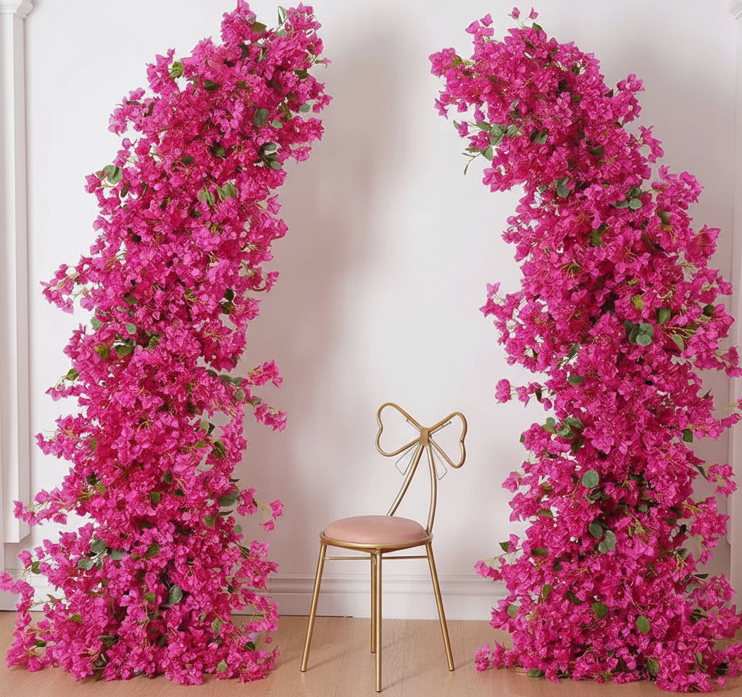 Two pink floral arches with a gold chair in the center on a white background, featuring the brand 'weddingstoryshop'.