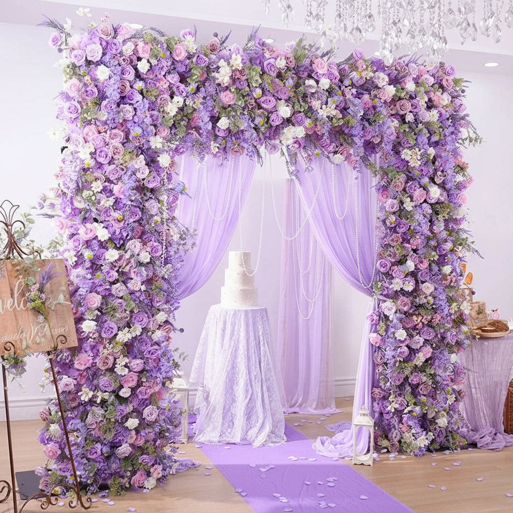 Floral arch decorated with purple and pink flowers in a room with 'weddingstoryshop branding.
