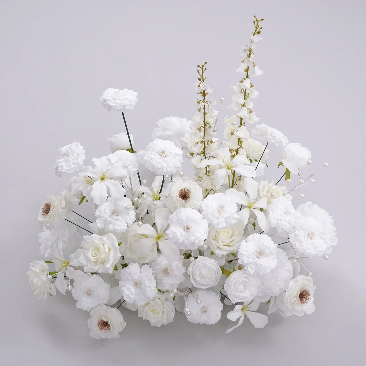 Bouquet of white flowers on a light gray background