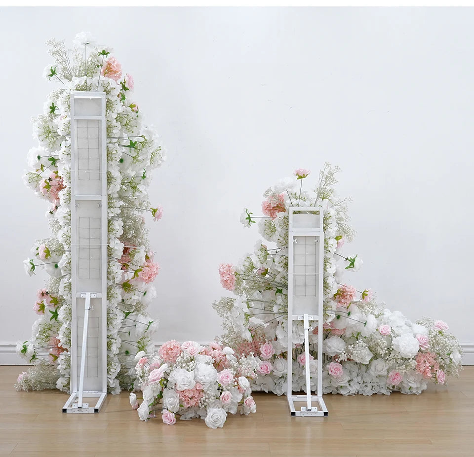 Floral arches with white and pink flowers on a plain white background