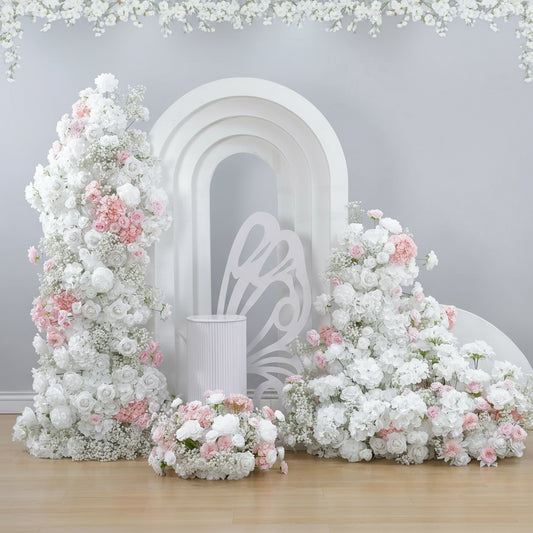 Floral arch and decorations with  branding on a white background.