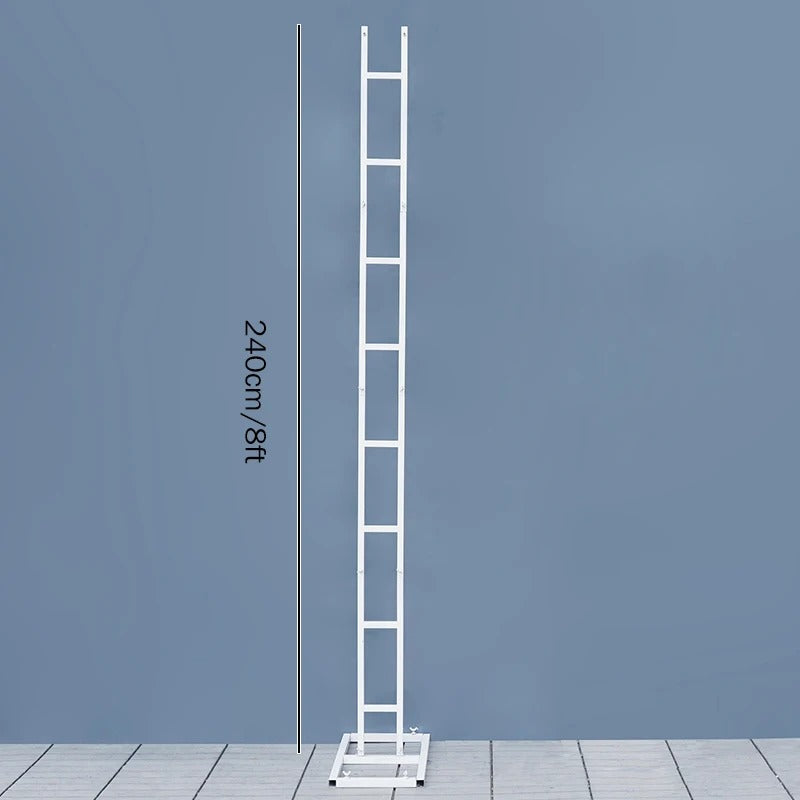 White ladder against a blue wall with measurement text