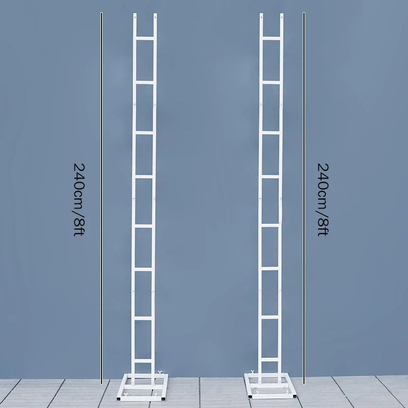 Two white ladders with measurements against a gray background