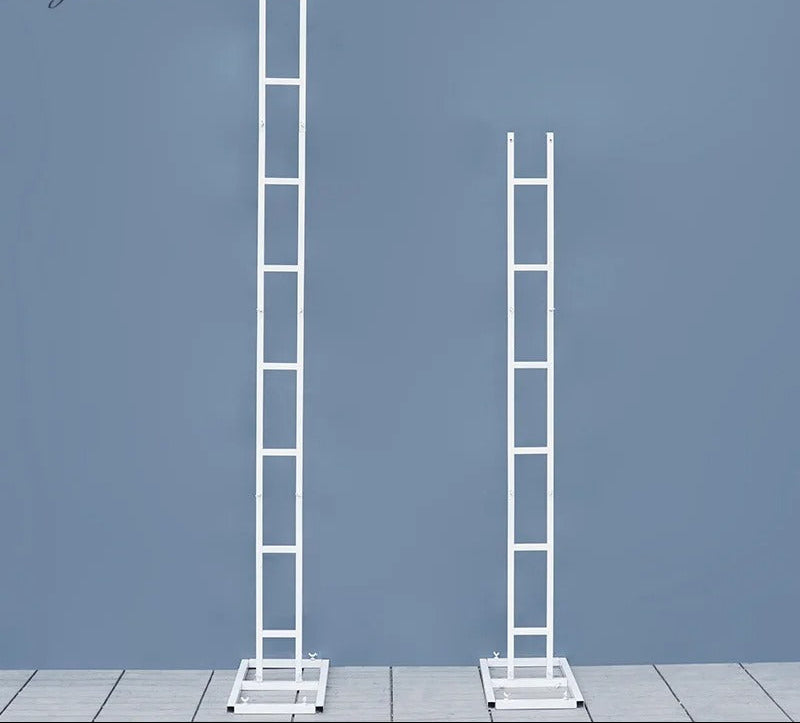 Two white ladder-shaped stands against a gray background with 'weddingstoryshop ' branding.